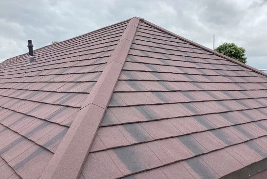 pitched roof with sky in background