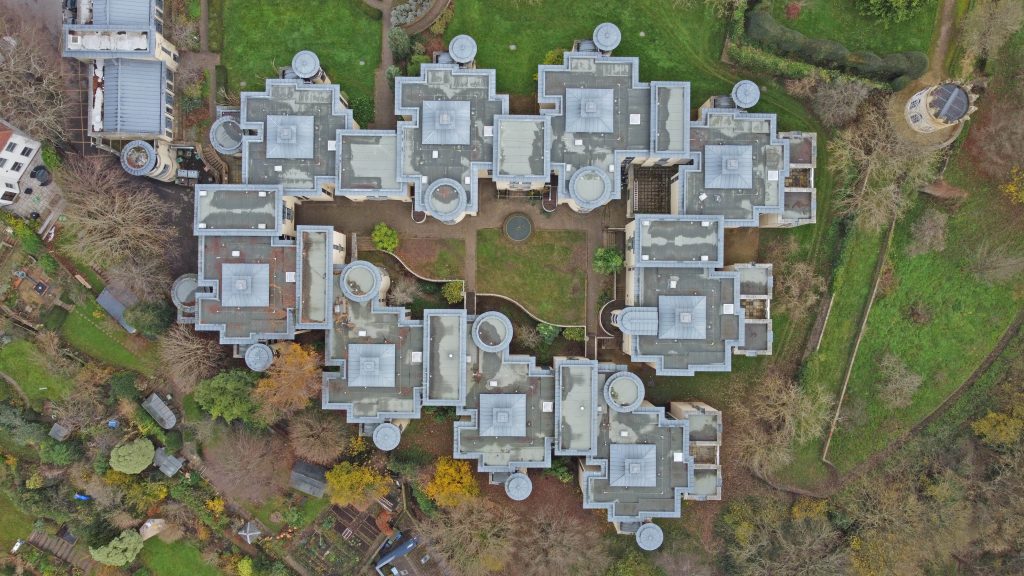 Drone-captured aerial view of Central Group roofing refurbishment project in progress.